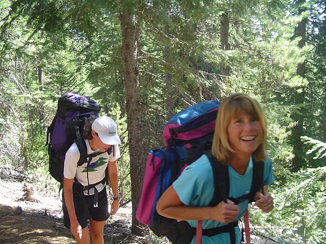Barb Ringstad and Karen Gnass schleping supplies 2.5 miles to Maiden Lake AS